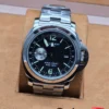 Panerai — esfera negra y brazalete plateado