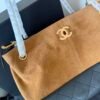 Chanel — Bolso bicolor camel y negro