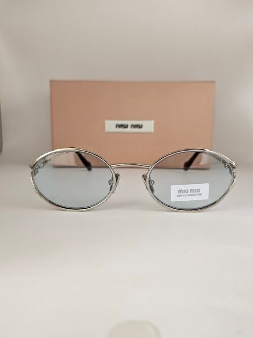 Miu Miu — Gafas ovaladas con lentes azul claro
