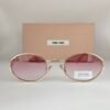 Miu Miu — Gafas ovaladas con lentes rosas