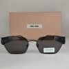 Miu Miu — Gafas rectangulares negras