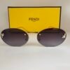 Fendi — Gafas ovaladas con lentes violeta degradado