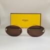 Fendi — Gafas ovaladas con lentes marrones