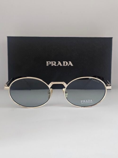 Prada — Gafas ovaladas con lentes gris azulado