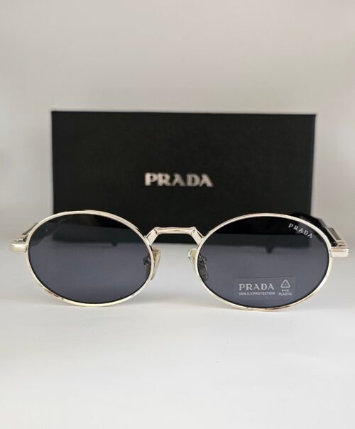 Prada — Gafas ovaladas con lentes violeta oscuro