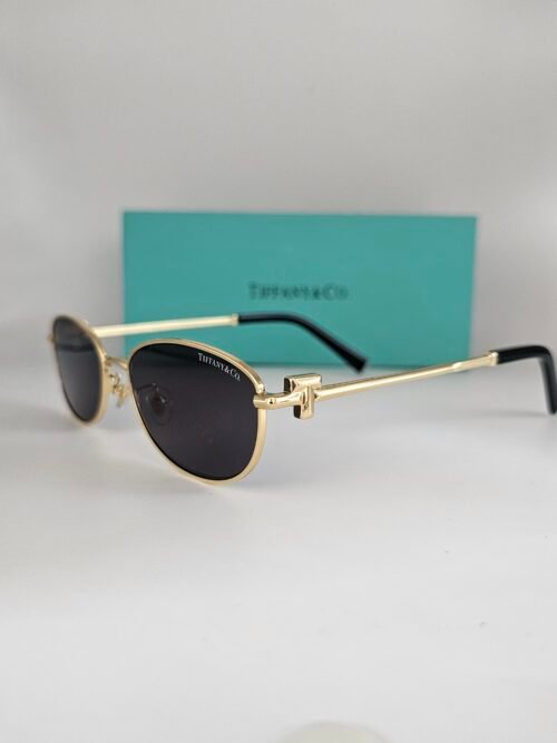 Tiffany — Gafas doradas con lentes oscuros