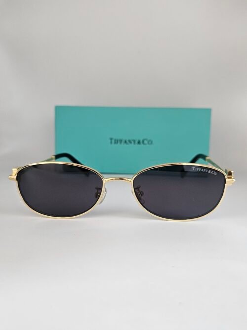 Tiffany — Gafas doradas con lentes oscuros
