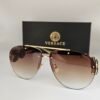 Versace — Gafas aviador con lentes marrón degradado
