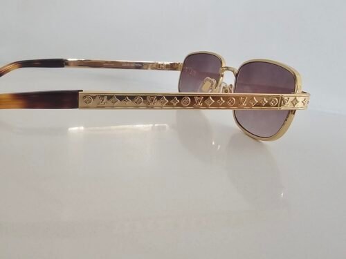 Louis Vuitton — Gafas doradas con lentes marrón claro