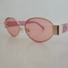 Chanel — Gafas ovaladas con lentes rosas