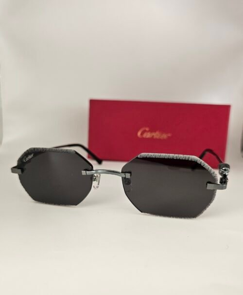 Cartier — Gafas octogonales negras con detalles plateados