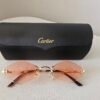 Cartier — Gafas ovaladas con lentes melocotón