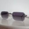 Cartier — Gafas rectangulares plateadas con lentes violetas