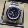 Tudor — esfera negra con detalles rojos