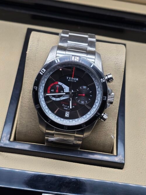 Tudor — esfera negra con detalles rojos