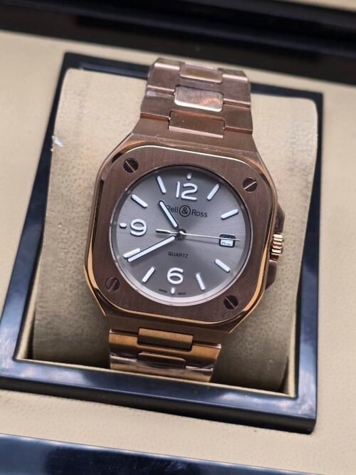 Bell & Ross — caja en tono dorado y esfera gris