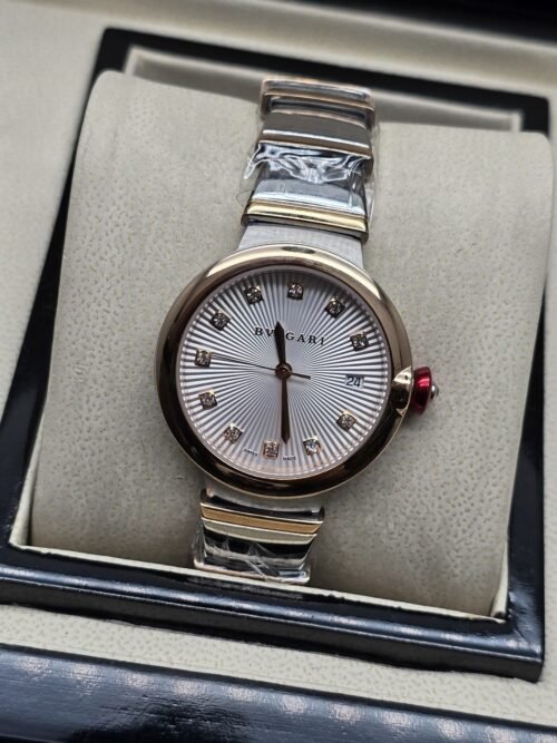 Bvlgari — esfera blanca y brazalete bicolor