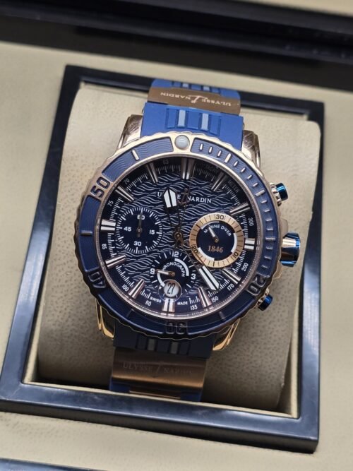 Ulysse Nardin — esfera azul y caja en tono dorado