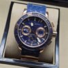 Ulysse Nardin — esfera azul texturizada y bisel en tono dorado