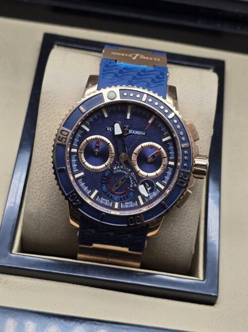 Ulysse Nardin — esfera azul con dos subesferas en tono dorado