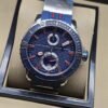 Ulysse Nardin — esfera azul texturizada con detalles rojos