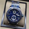 Ulysse Nardin — esfera azul con detalles amarillos y correa azul