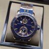 Ulysse Nardin — esfera azul con detalles dorados y correa azul