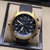 IWC — esfera negra y caja en tono dorado