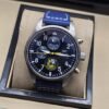 IWC — esfera azul con detalles amarillos y correa azul