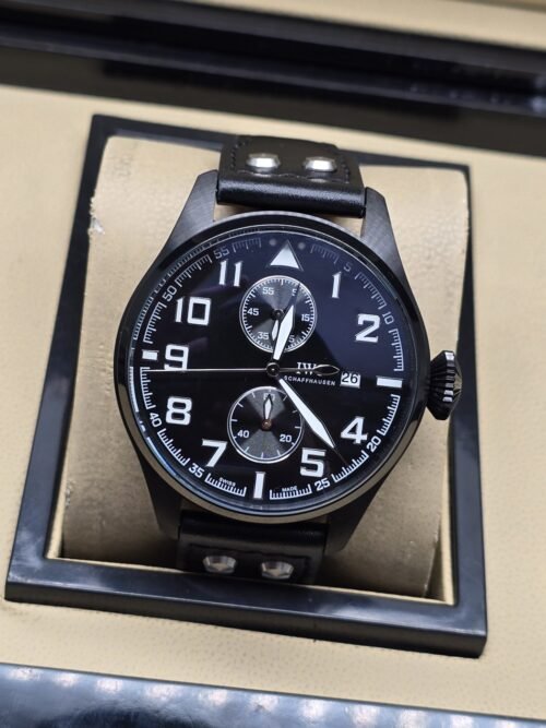 IWC — esfera negra con dos subesferas y caja negra