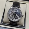 IWC — esfera abierta plateada y correa negra
