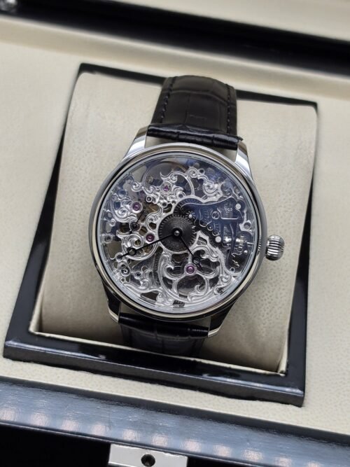 IWC — esfera abierta plateada y correa negra