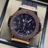 Hublot — esfera negra y bisel en tono dorado