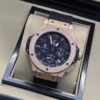 Hublot — esfera negra abierta y correa beige