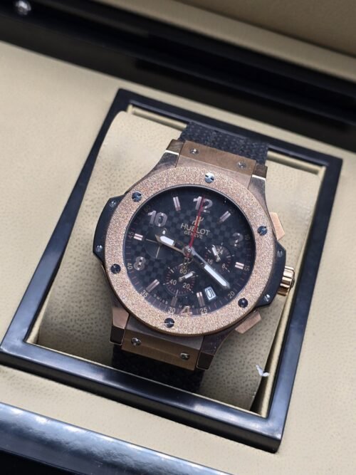Hublot — esfera negra y caja en tono rosado