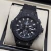 Hublot — esfera abierta negra y caja texturizada