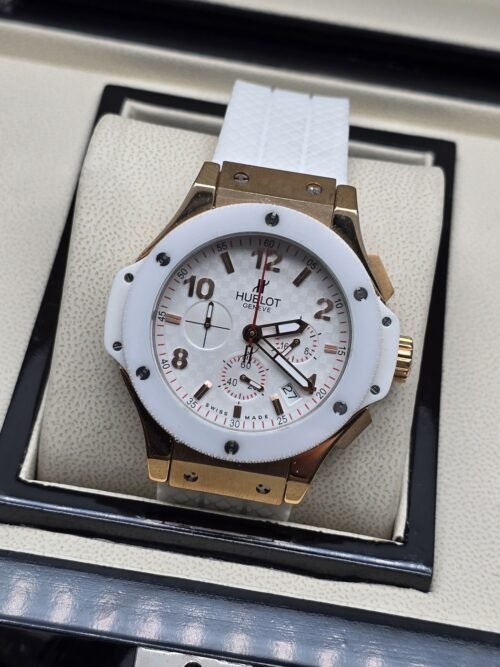 Hublot — esfera blanca y caja en tono dorado