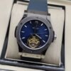 Hublot — esfera azul con apertura y correa azul grisácea