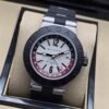 Bvlgari — esfera blanca con detalles rojos y correa negra