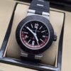 Bvlgari — esfera negra con detalles rojos y correa negra