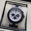 Bvlgari — esfera blanca con tres subesferas negras
