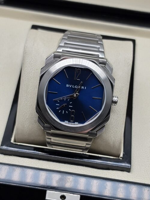 Bvlgari — esfera azul y caja octogonal plateada
