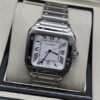 Cartier — esfera blanca cuadrada y brazalete plateado