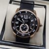 Cartier — esfera negra deportiva y caja en tono dorado