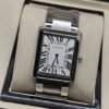 Cartier — esfera blanca rectangular y bisel negro