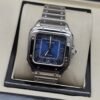 Cartier — esfera azul cuadrada y brazalete plateado