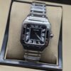 Cartier dama — esfera negra cuadrada y brazalete plateado