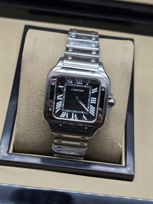 Cartier dama — esfera negra cuadrada y brazalete plateado