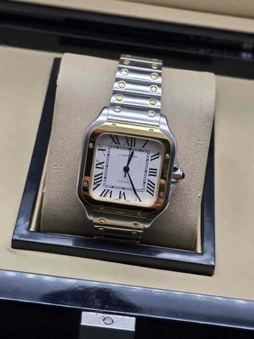 Cartier dama — esfera blanca y bisel dorado
