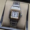 Cartier dama — esfera blanca cuadrada y brazalete bicolor dorado